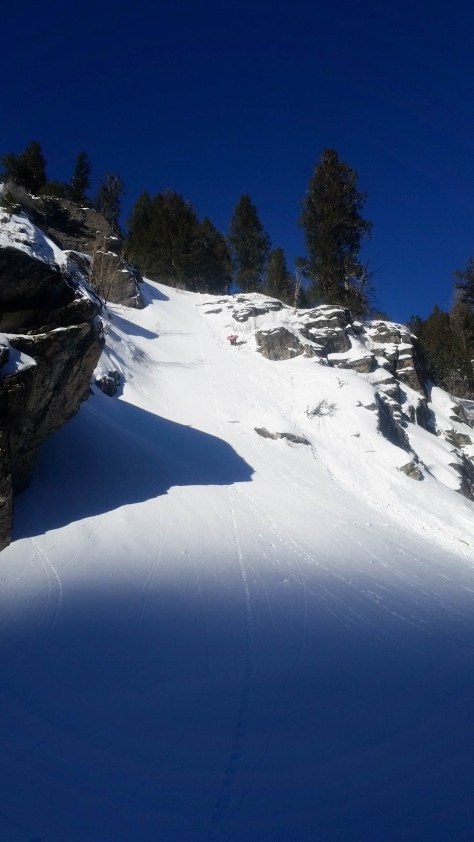 Brian making his way down to his ski, very luck to be safe.