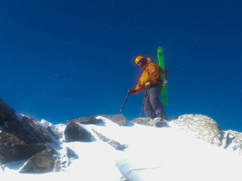 Tristen battling the wind on the summit.