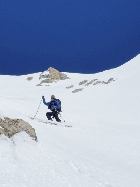 Dane, navigating down the middle portion of couloir.